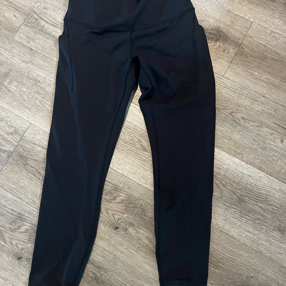 NWOT Wunder Train High Rise Tights with Pockets. 25”